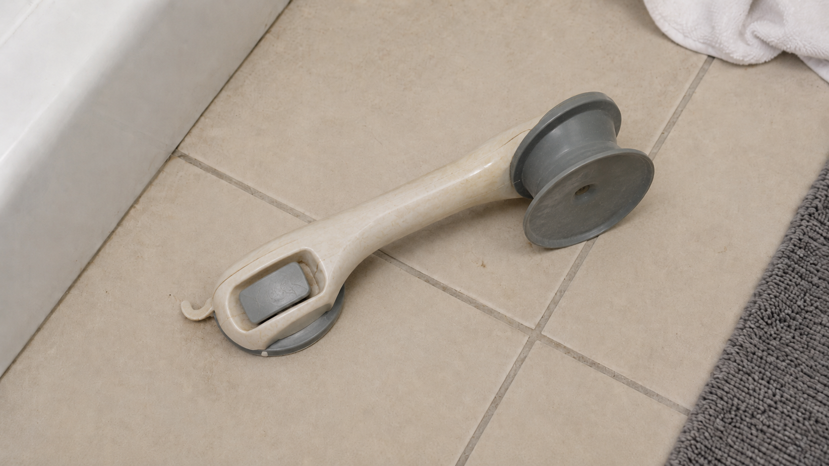 Cheap suction grab bar fallen off shower wall